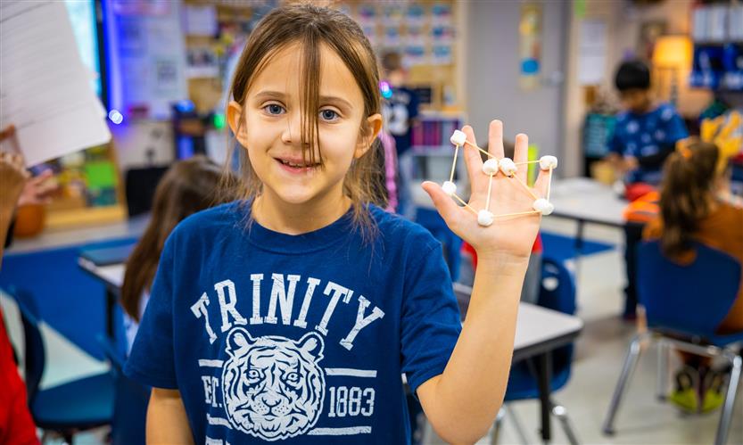 Students make constellations out of marshmallows and toothpicks